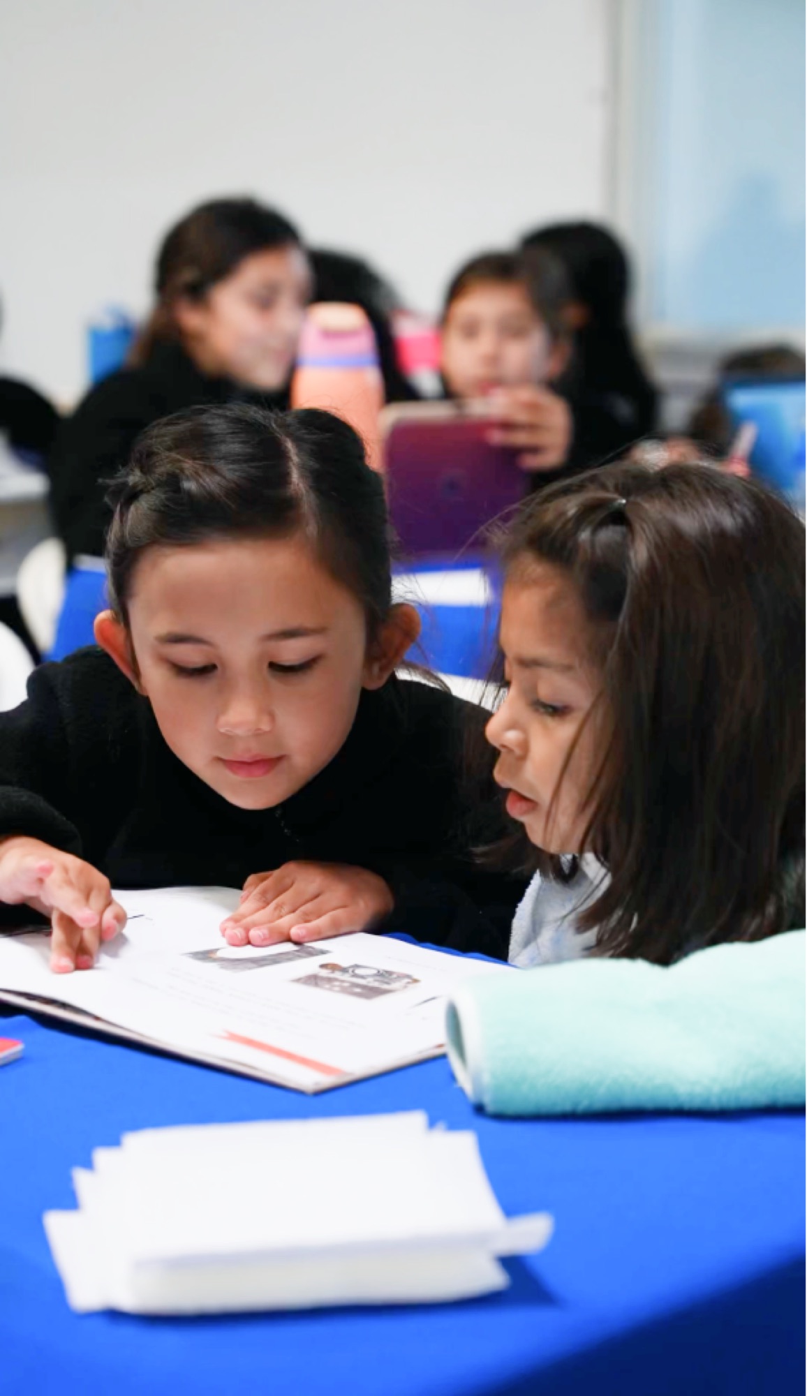 A student works on homework during the After School Program.