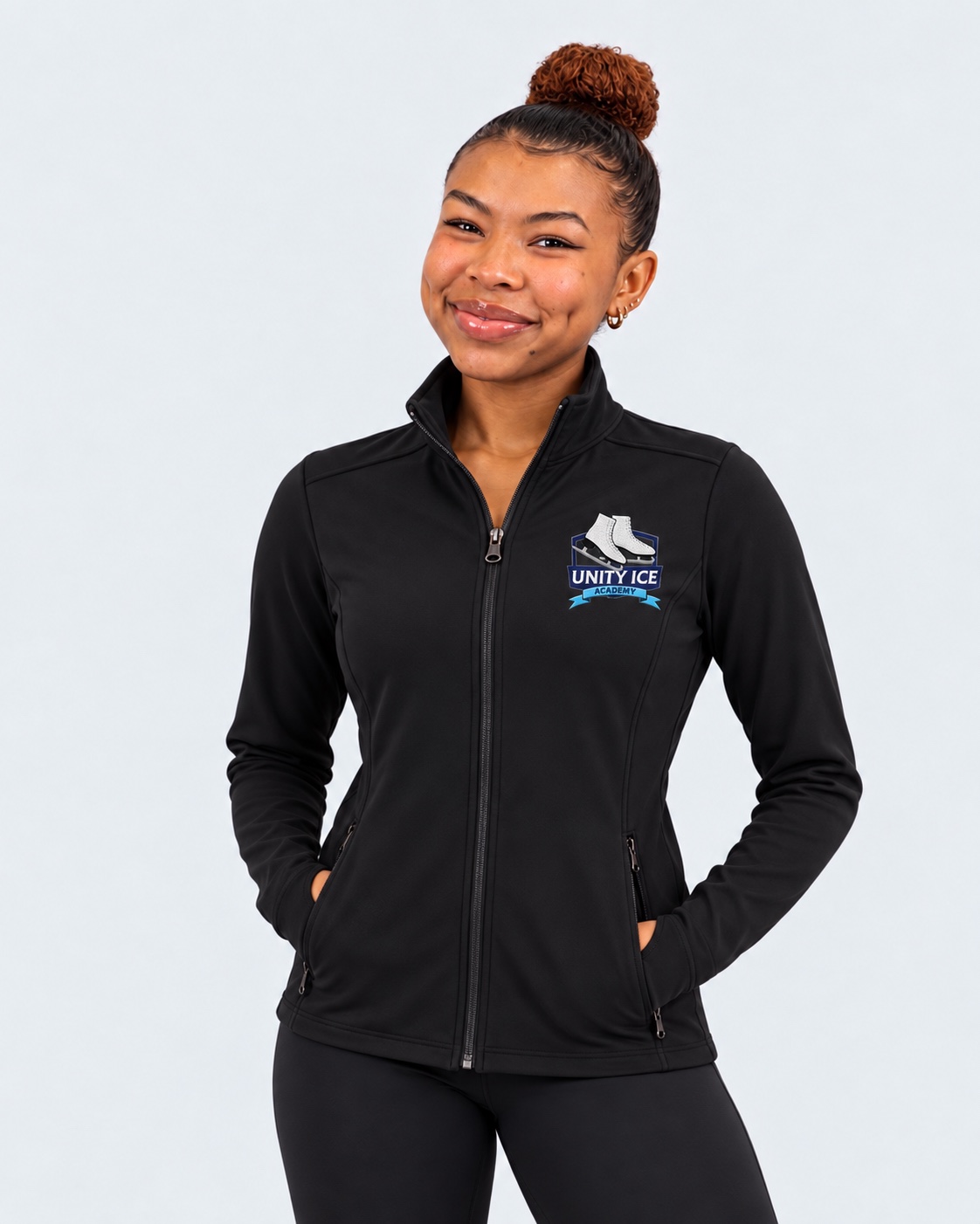 AI-generated mockup of Starr Andrews wearing a black Unity Ice Academy athletic zip-up jacket.